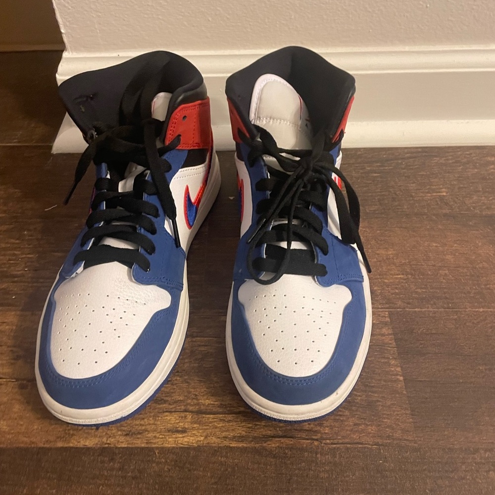 These are jordan 1 with a multicolor swoosh